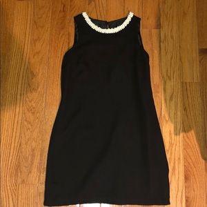 Fake pearl lined black dress